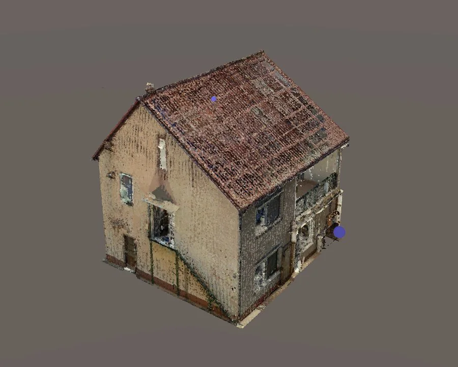 The finished scan: one house, cleaned back to its own walls and roof, ready to upload.