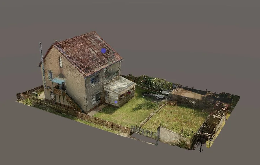 The original scan: a house with its garden, fences and a second building, all in one point cloud.